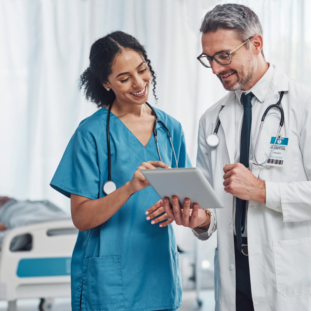 MD Billing physician and nurse reviewing operational data together